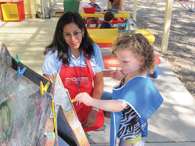 teacher_shares_outside_painting_time